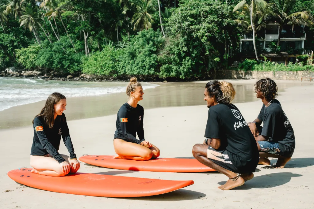 Our local surf guides teaching the beginner surfers