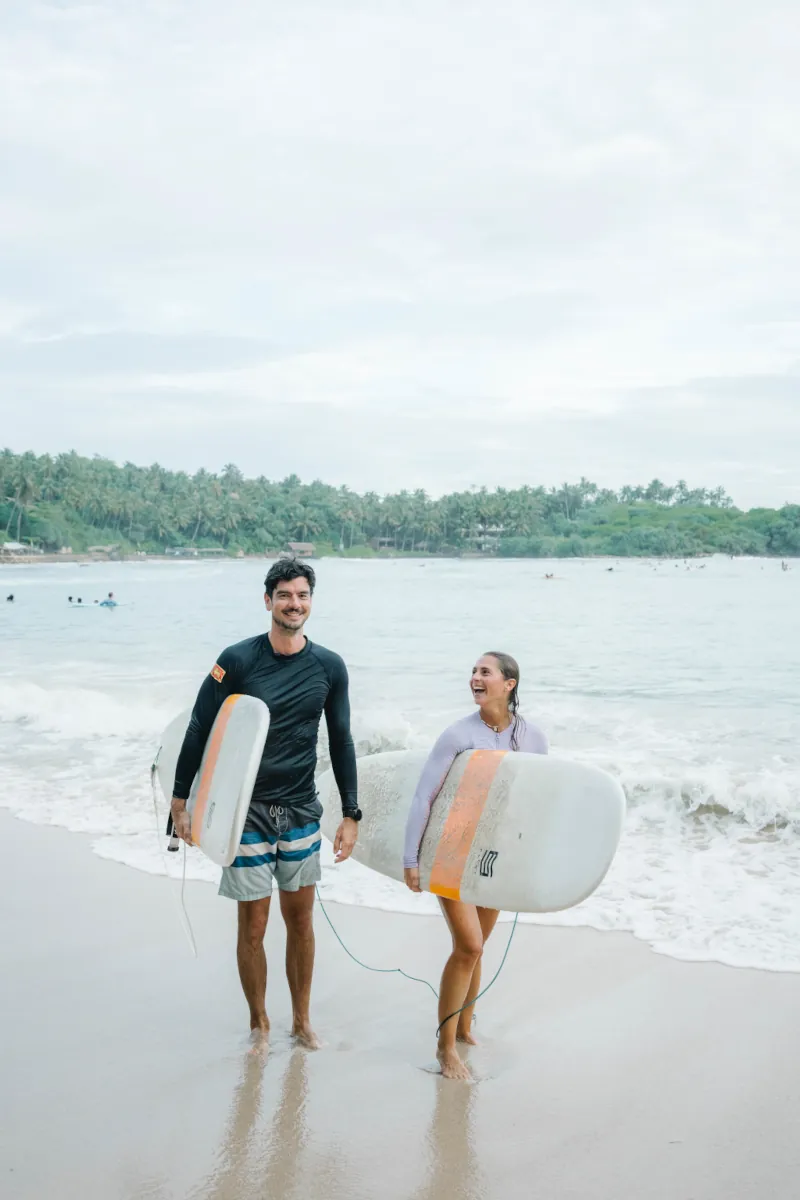 two happy surfers after their surf session in Sri Lanka