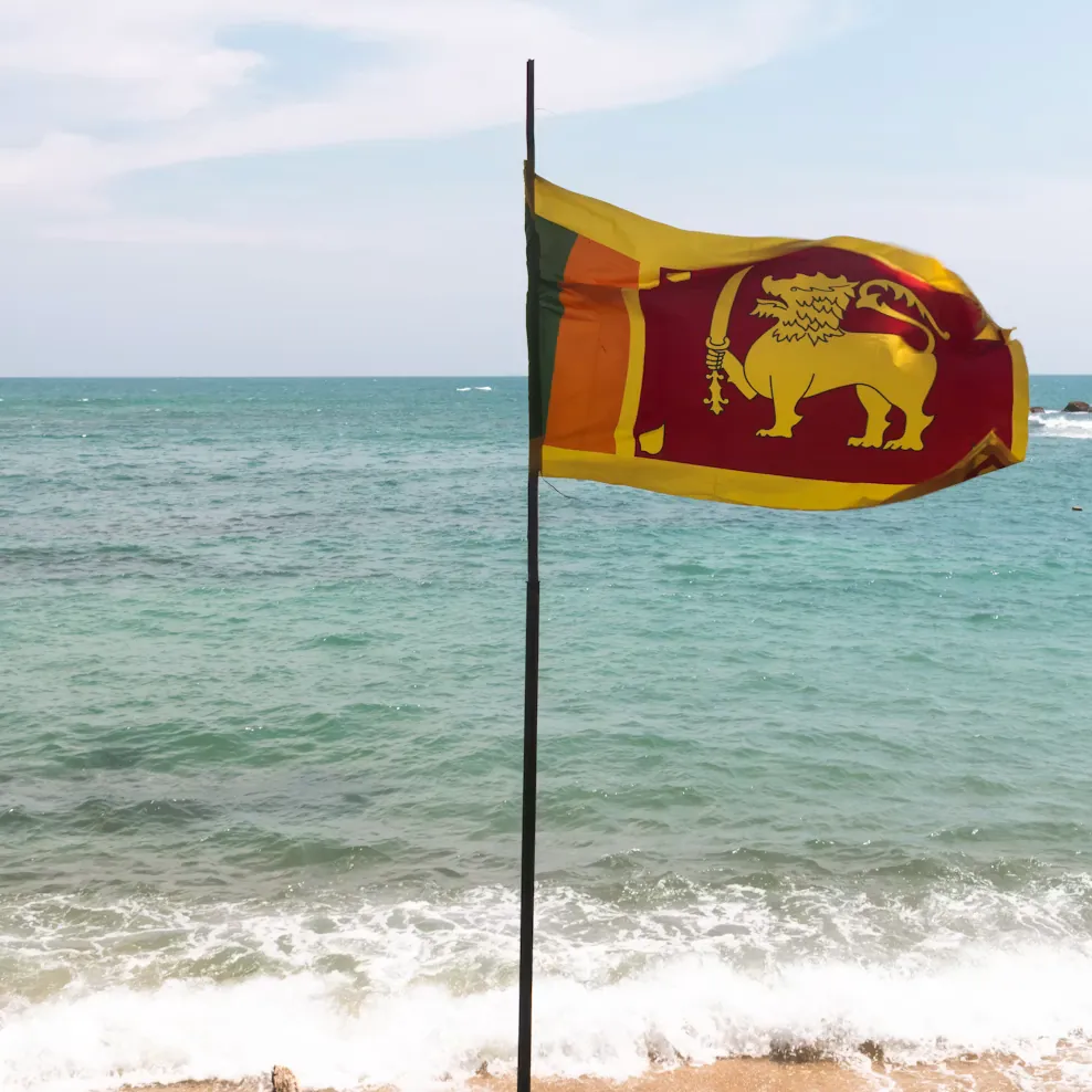 The Sri Lankan flag on the beach
